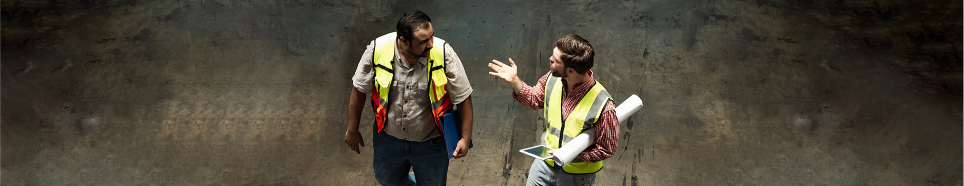 Two engineers talking about projects